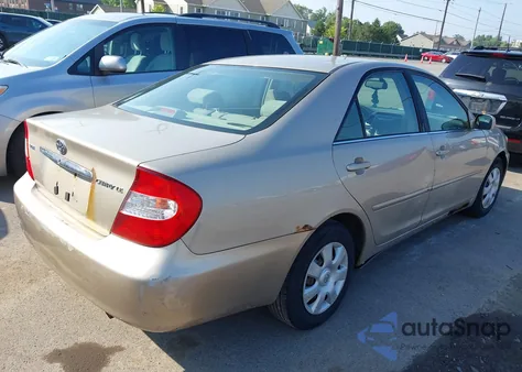 2003 Toyota Camry Le from USA, damaged, VIN 4T1BE32KX3U181028